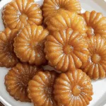 Yakgwa cookie recipe on ceramic plate with honey